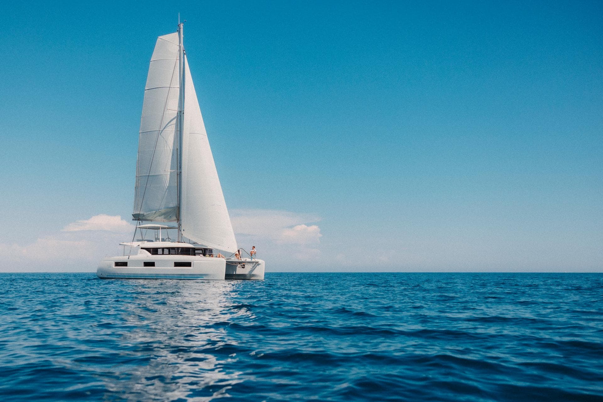 Cruising catamaran sailing offshore